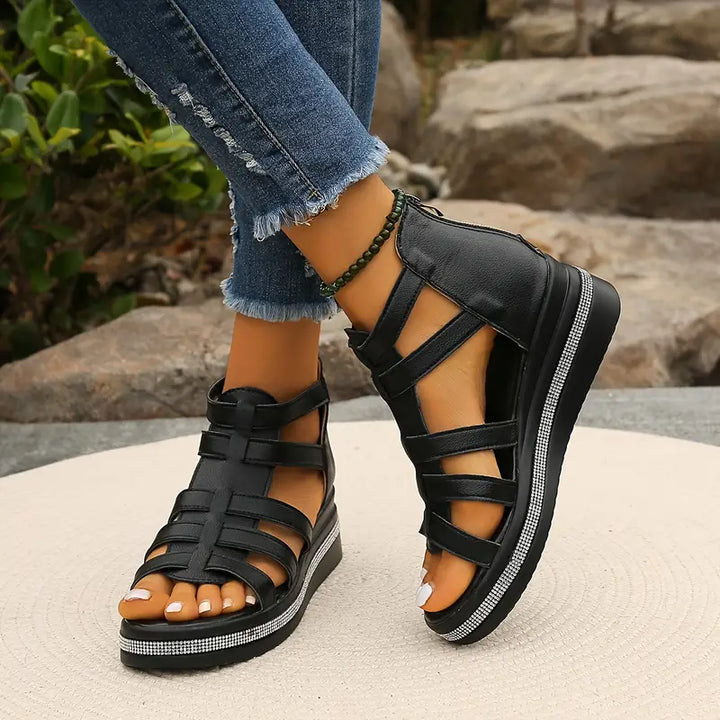 Elegant flat sandals for women, featuring dazzling rhinestones and adjustable straps.