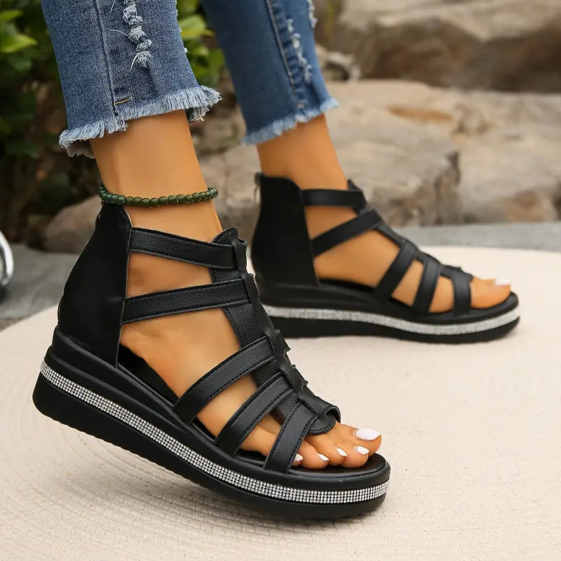 Pair of women's summer sandals, comfort-focused, adorned with shining rhinestones.