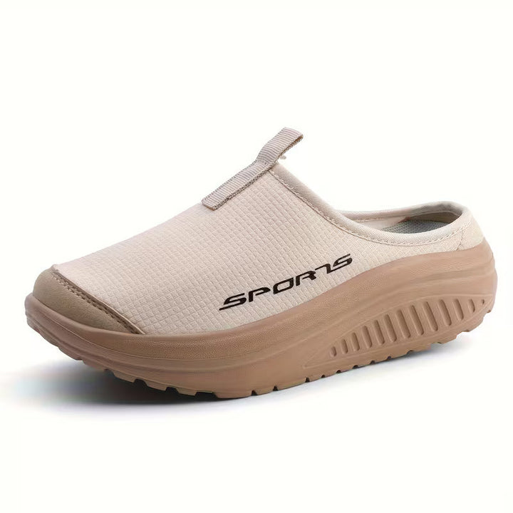 Women's comfort slip-on closed-toe orthopedic slippers, ideal for indoor support & cushioning.