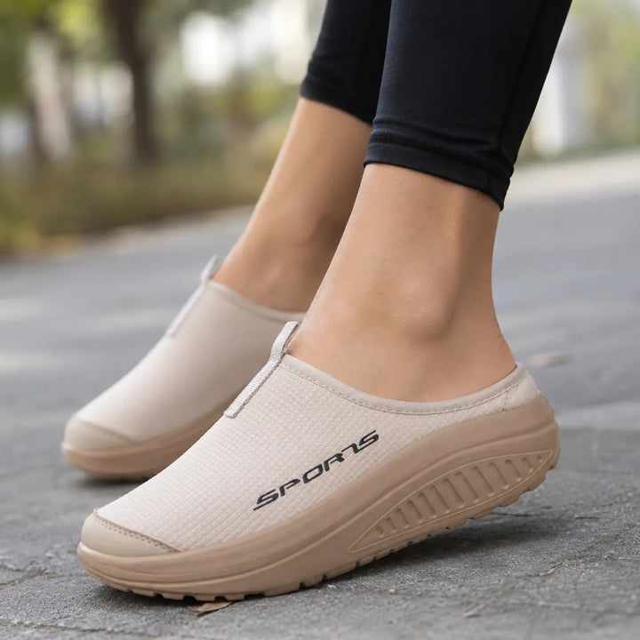 Cushioned slip-on women's home shoes, orthopedic and closed-toe for superior comfort & support.