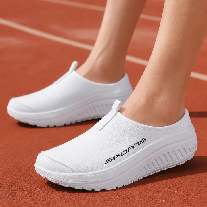Supportive women's closed-toe slip-on slippers, perfect orthopedic footwear for home comfort.