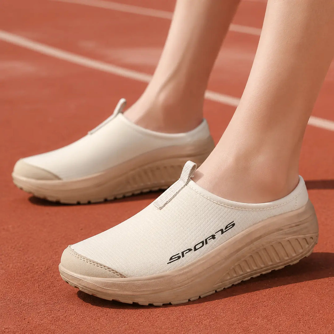 Comfortable women's closed-toe slippers, slip-on design, perfect orthopedic home footwear.