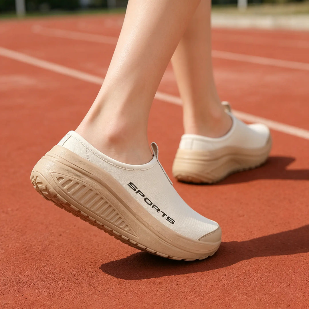 Women's orthopedic slip-on slippers with a closed toe, providing cushioned and supportive comfort.