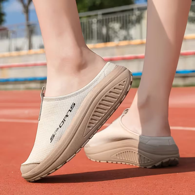 Closed-toe women's comfort slippers, slip-on style, offering orthopedic support & cozy warmth.