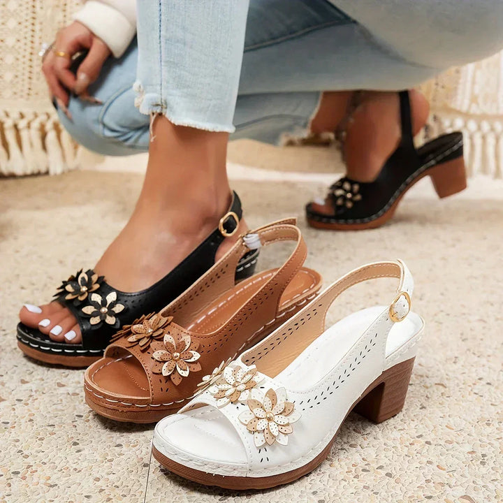 Supportive open-toe women's sandals with adjustable straps, ideal comfortable daily wear footwear.
