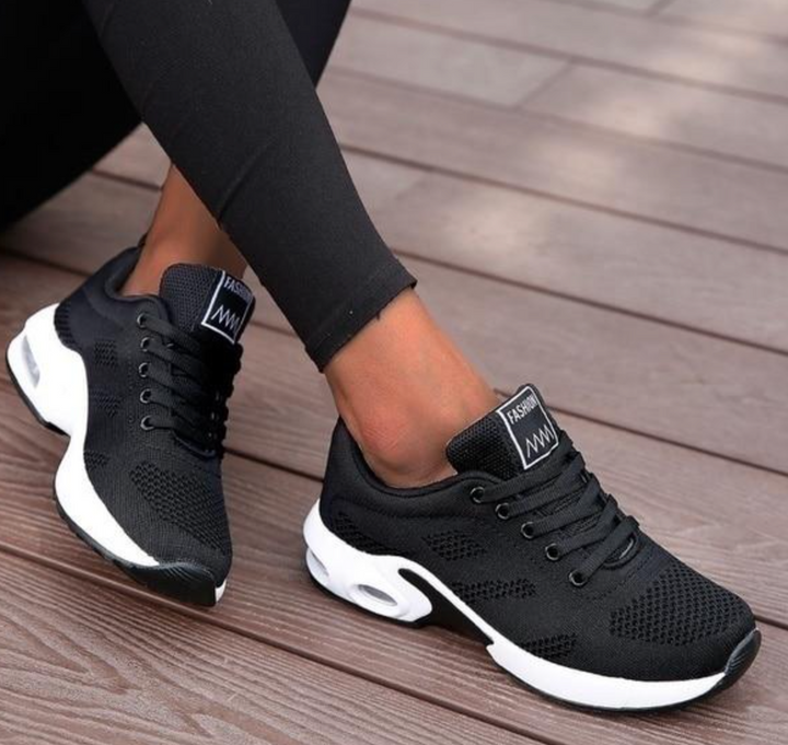Women's comfortable air-cushioned athletic sneakers for running, walking & fitness. Breathable, lightweight design.