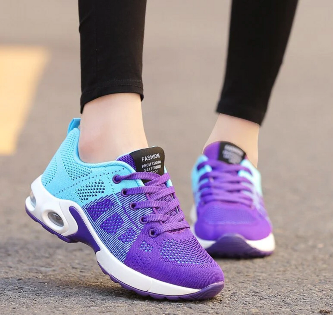 Modern women's athletic sneakers with breathable mesh, air cushioning, and lightweight design for active lifestyles.