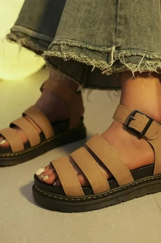 Versatile women's sandals offering arch support and comfort. Stylish, lightweight slip-on footwear for warm weather.