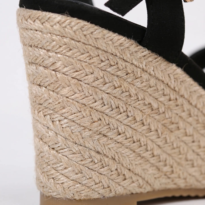 Comfortable women's open-toe wedge sandals with adjustable strap, ideal platform summer shoes for everyday fashion.
