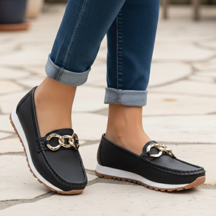 Slip-on women's flat buckle loafers, designed for everyday comfort and stylish casual wear.