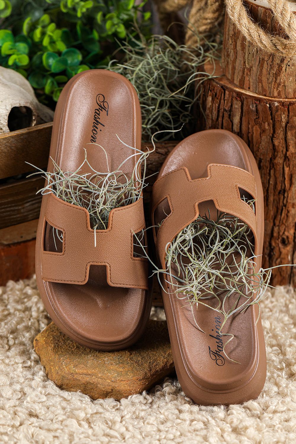 Comfortable women's everyday sandals with a modern strappy design.