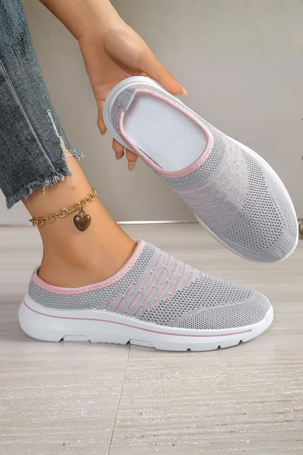 Stylish grey women's platform slip-on mules. Comfortable, breathable casual shoes perfect for everyday summer fashion.