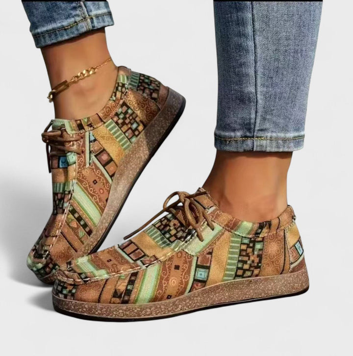 Stylish women's casual sneakers with soft cushioning & wide heel support for ultimate comfort.
