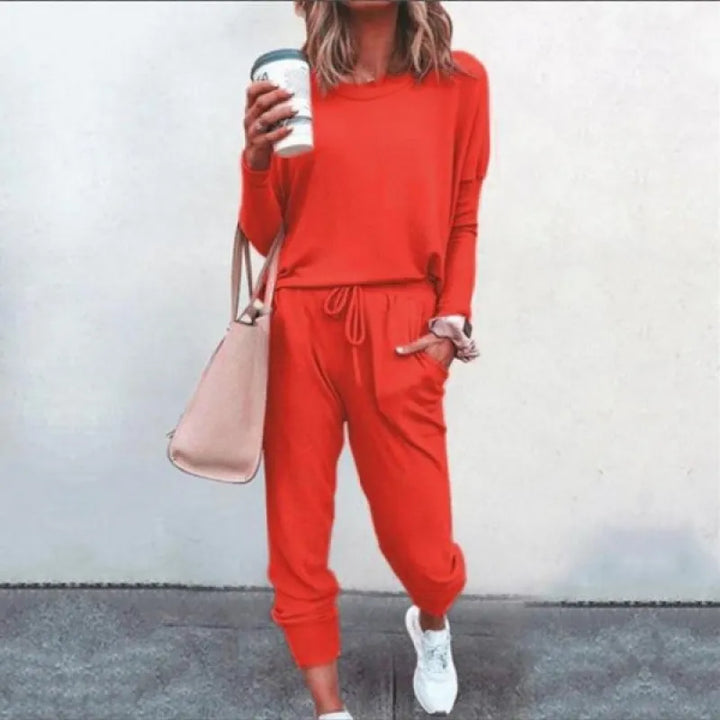 Casual women's matching jogger set. Crew neck long sleeve top and tapered pants for relaxed everyday wear.