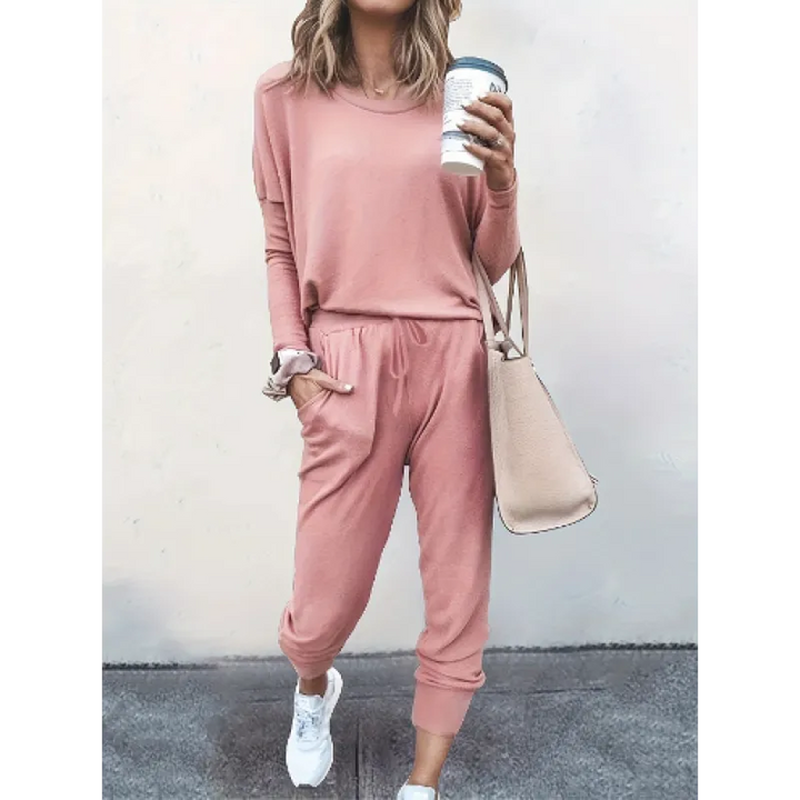 Women's long sleeve crew neck top and tapered jogger pants, a comfortable two-piece matching set.