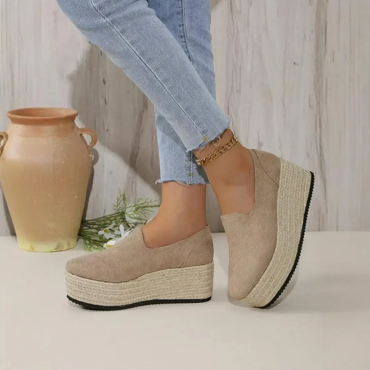 Chic women's espadrille platform slip-on shoes, offering both style and comfort.