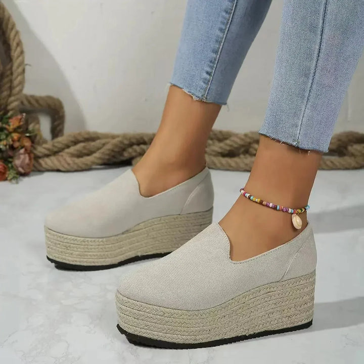 Elegant women's platform espadrille slip-on shoes for a chic summer look.