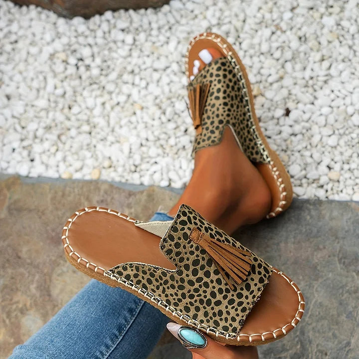 Women's comfortable footwear, flat slip-on sandals for all-day support and summer style.
