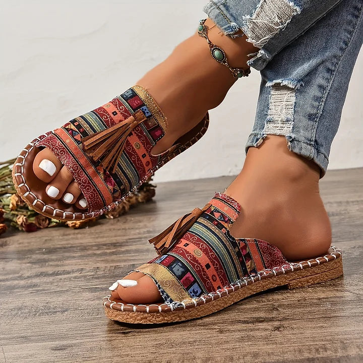 Women's flat beach sandals, comfortable slip-on style, perfect for vacation & summer leisure.