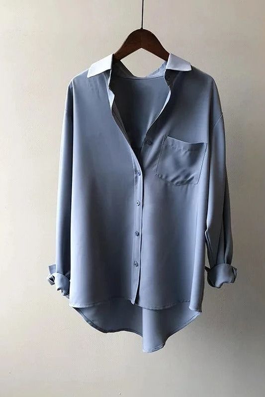 Women's comfortable flowy blouse, perfect for everyday style. Relaxed fit top in soft fabric.