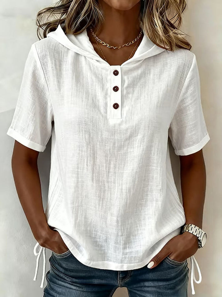 Women's comfortable hooded shirt with a relaxed fit, perfect for casual everyday wear in spring or fall.