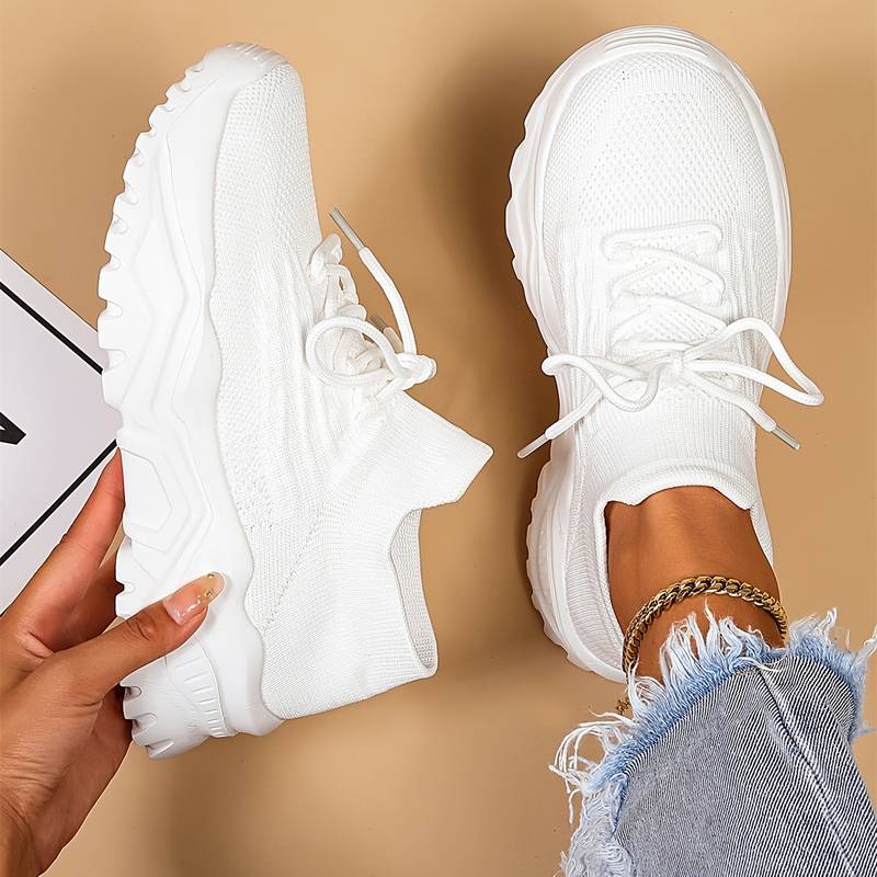 Women's comfortable lace-up sneakers with chunky sole, perfect for casual everyday style.