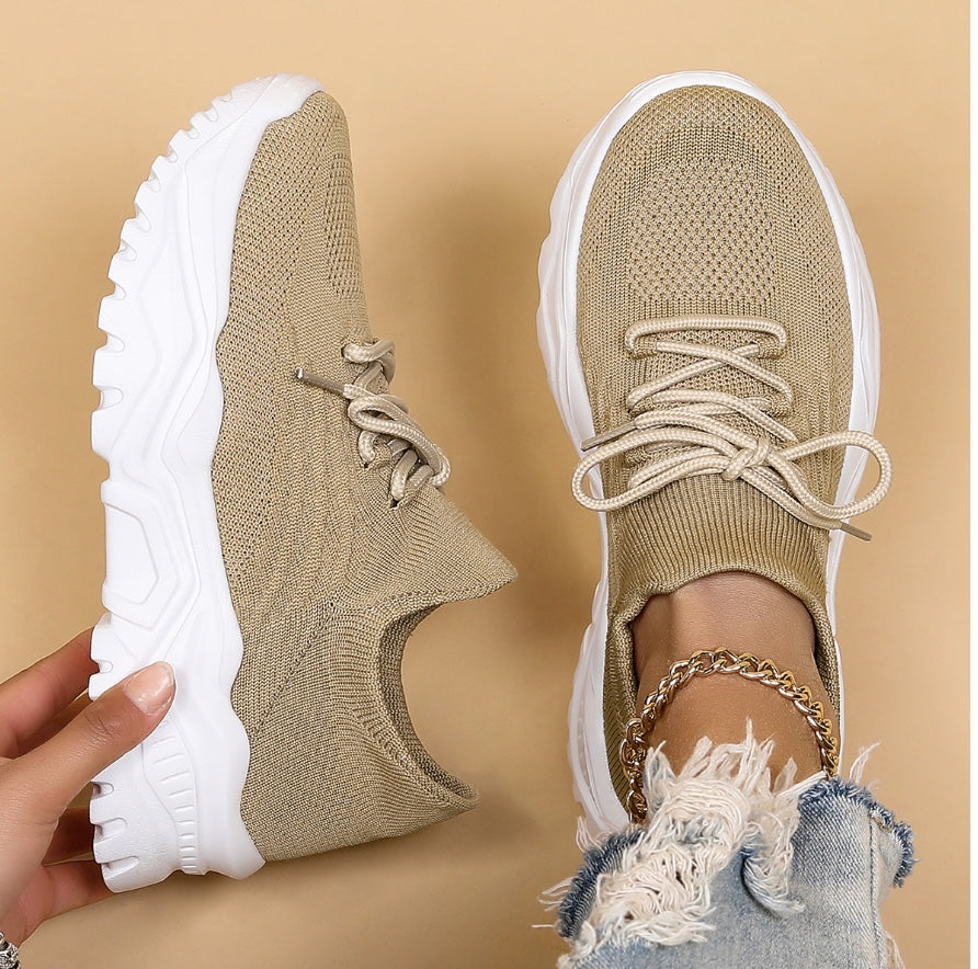 Modern women's casual sneakers with a comfortable chunky sole, lace-up for a secure fit & versatile everyday style.