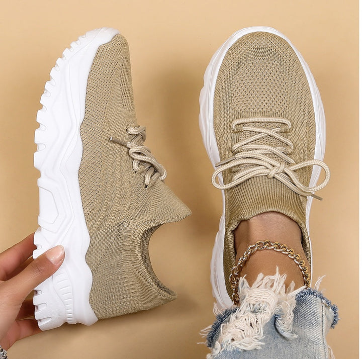 Modern women's casual sneakers with a comfortable chunky sole, lace-up for a secure fit & versatile everyday style.