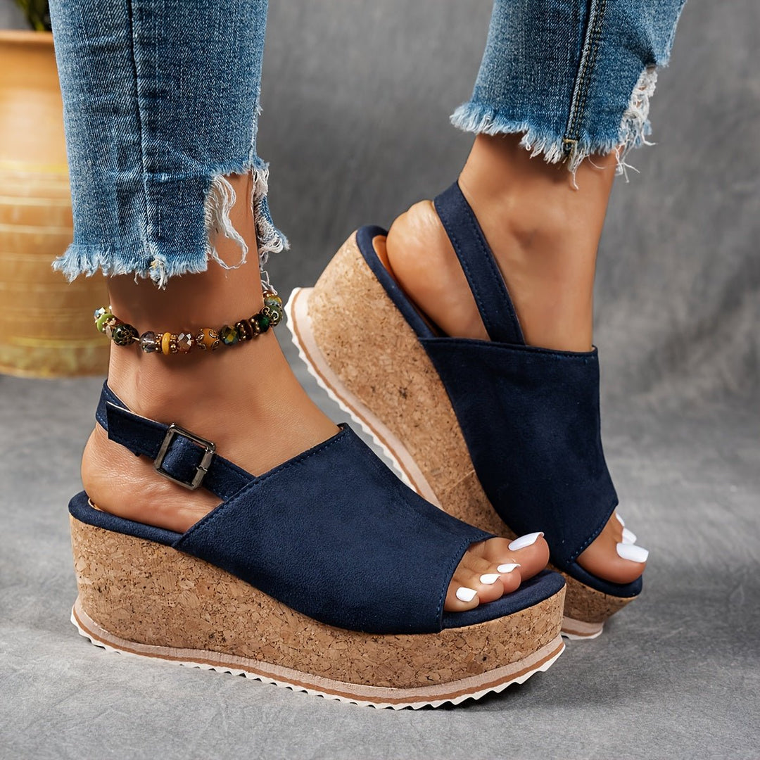Chic women's leopard print platform wedge sandals with a supportive design, great for casual fashion.