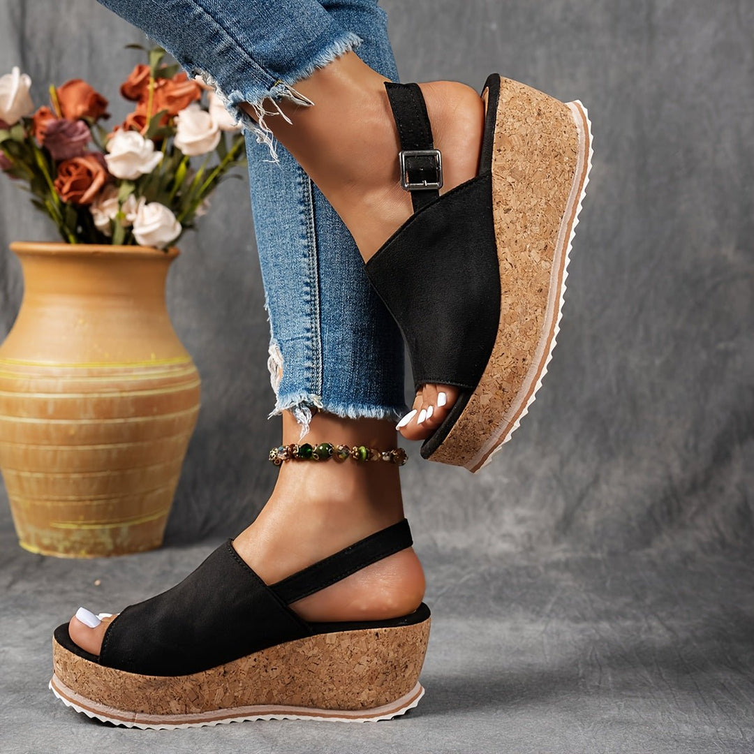 Trendy women's leopard print wedge platform sandals with an open-toe design, ideal for summer fashion.