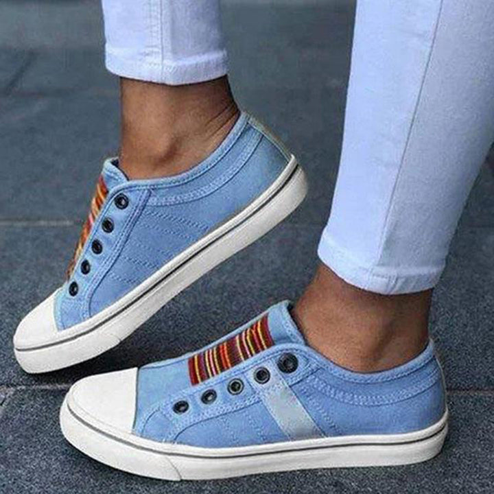 Stylish women's lace-up lightweight trainers, perfect for comfortable walking and casual everyday fashion.