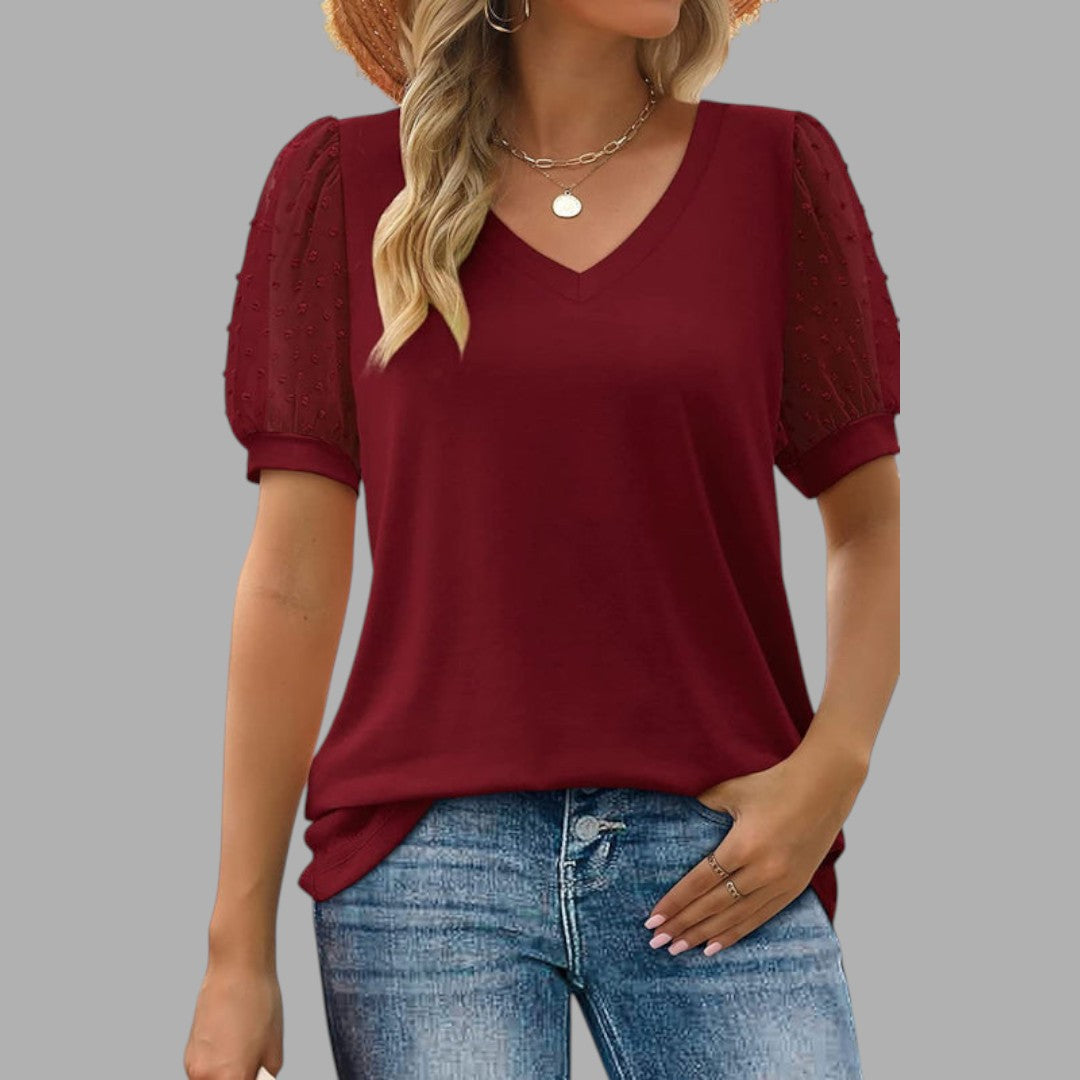 Stylish women's round neck blouse, ideal for casual outfits or dressed-up looks. A comfortable everyday wardrobe essential.
