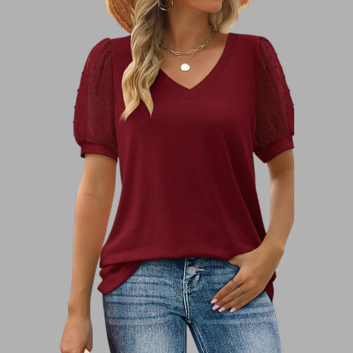 Stylish women's round neck blouse, ideal for casual outfits or dressed-up looks. A comfortable everyday wardrobe essential.
