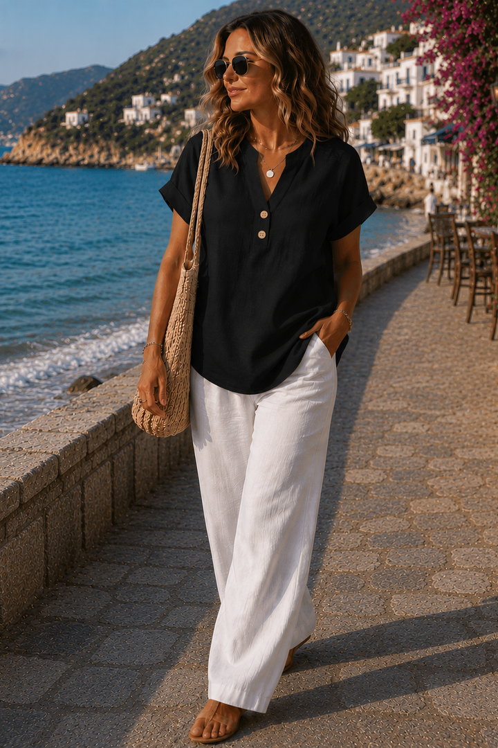 Women's comfortable long sleeve shirt with button detail. Versatile for casual, office, or travel.