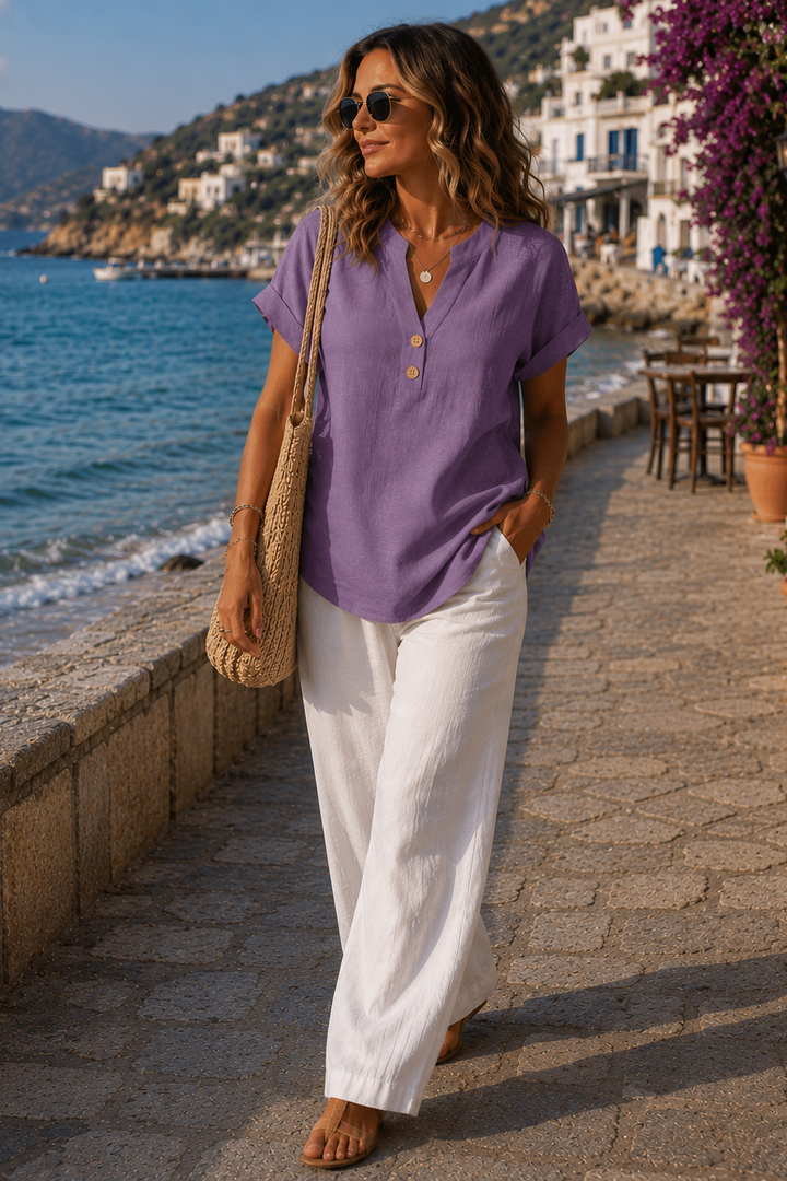 Comfortable women's lightweight shirt. Ideal for office or travel, with stylish button details.