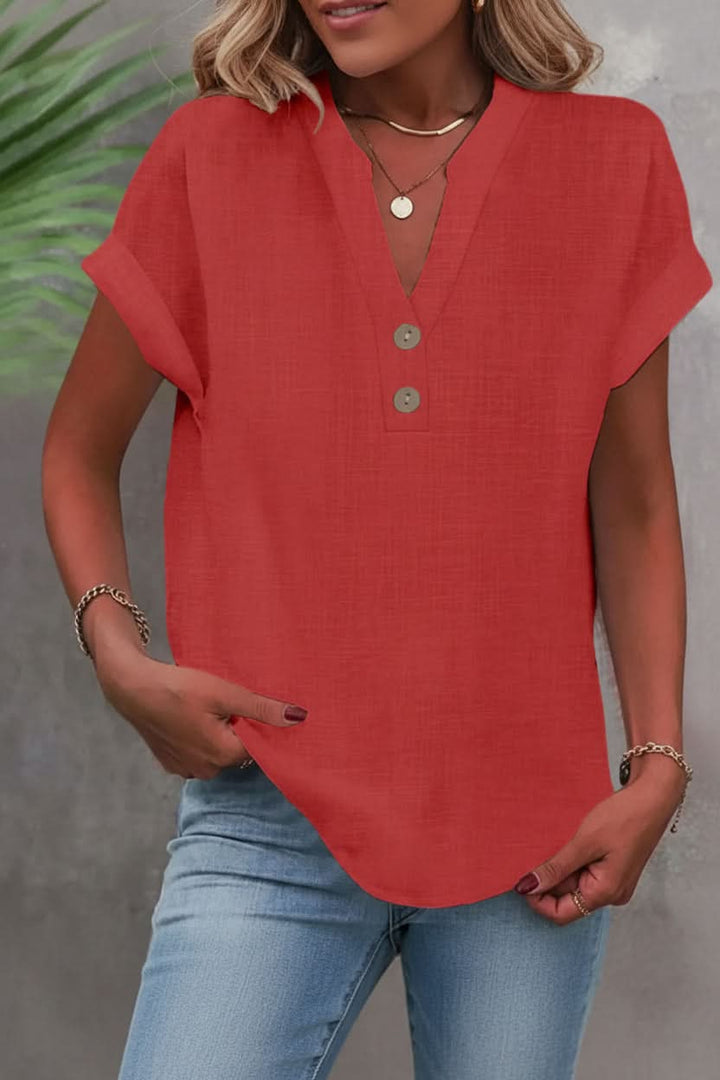 Modern women's long sleeve top. Distinctive button detailing, a versatile and comfortable fashion staple.