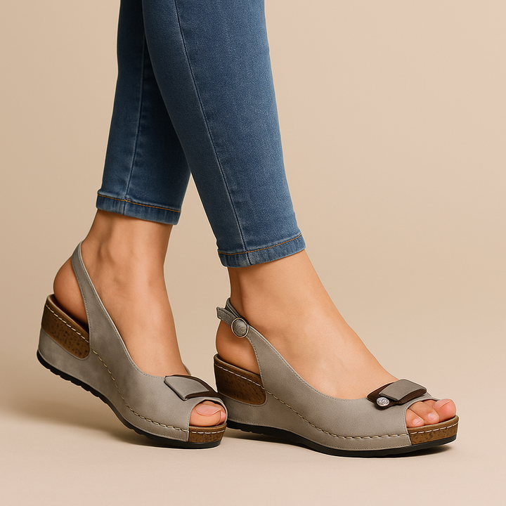 Comfortable women's wedge sandals with peep toe, slingback, and adjustable strap. Ideal for summer casual style.