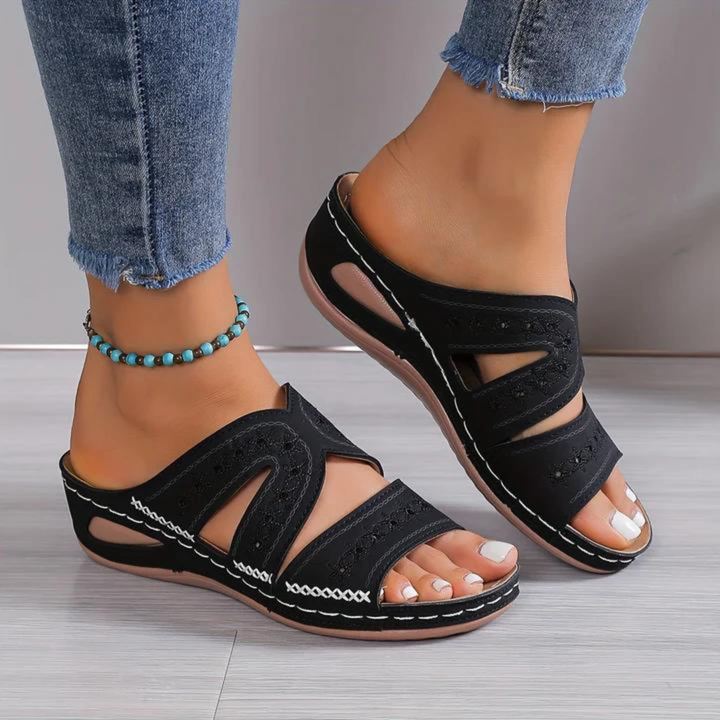 Stylish open toe women's sandals with arch support, cushioning for all-day comfort.