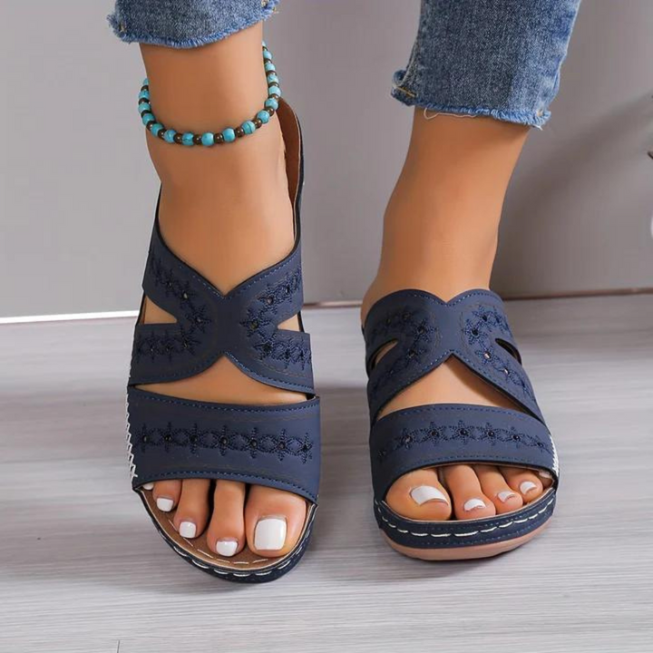 Orthopedic women's open toe sandals, cushioned footbed, arch support for supreme comfort.