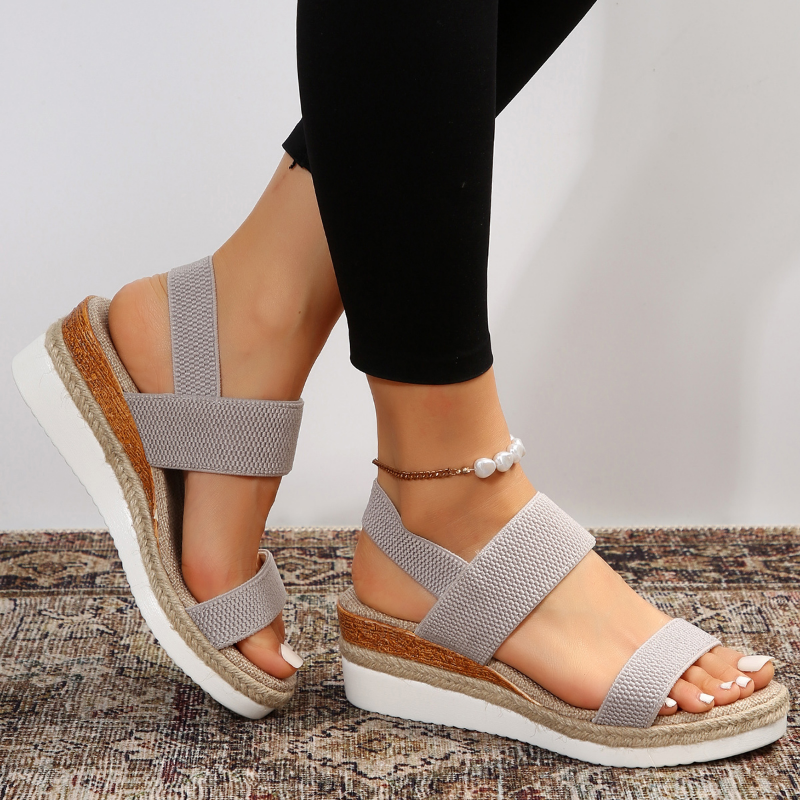 Open-toe women's orthopedic platform sandals with a cushioned sole, designed for ultimate summer comfort.