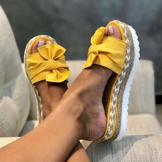 Women's comfortable arch support platform sandals in action. Ideal summer footwear for walking & daily use.