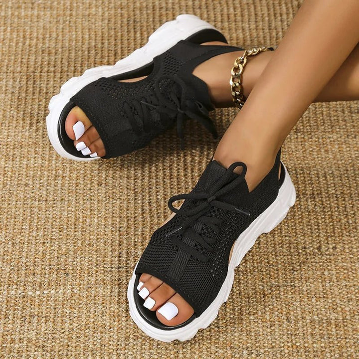 Trendy open toe platform sandals for women, offering orthopedic support and a stylish cutout design.