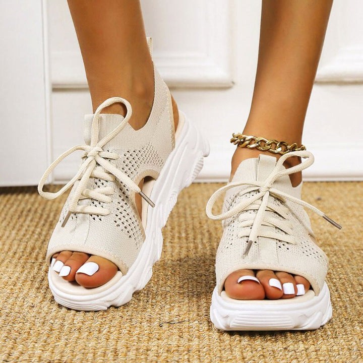 Cushioned platform sandals for women with a lace-up front, perfect for summer casual wear and comfort.