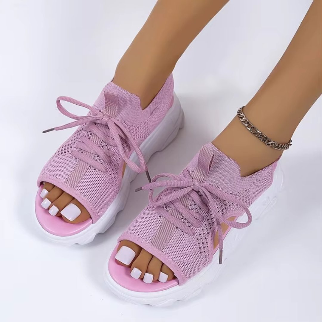 Walking sandals for women: lace-up platform style with orthopedic cushioning and a chic cutout design.