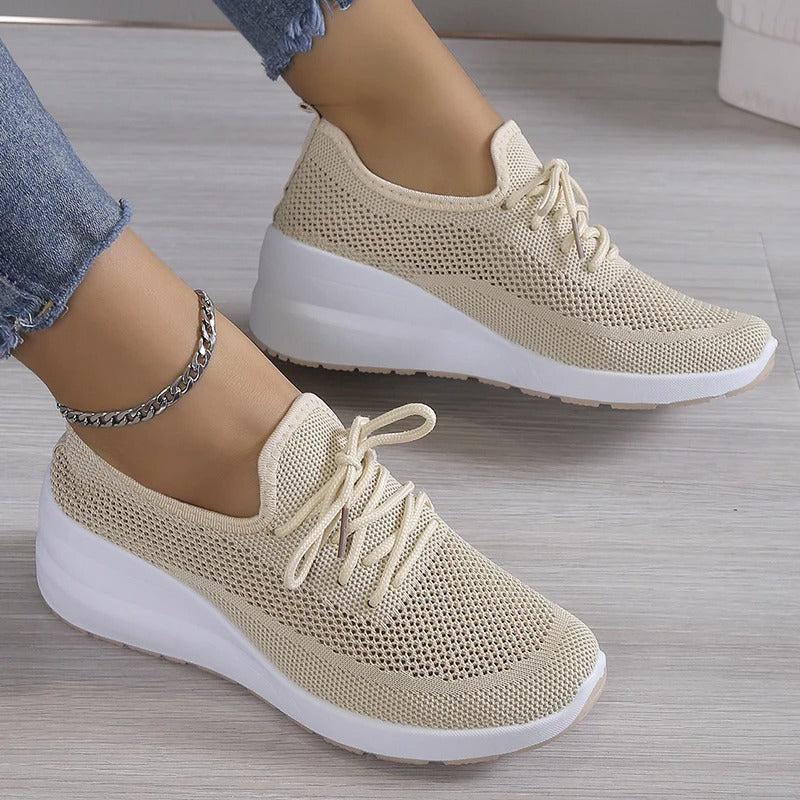 Women's comfortable platform wedge sneakers, perfect for elevated style & everyday wear.
