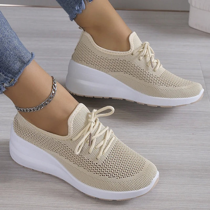 Women's comfortable platform wedge sneakers, perfect for elevated style & everyday wear.