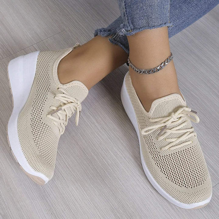 Stylish women's wedge platform sneakers, height-enhancing & perfect for fashion-forward casual looks.