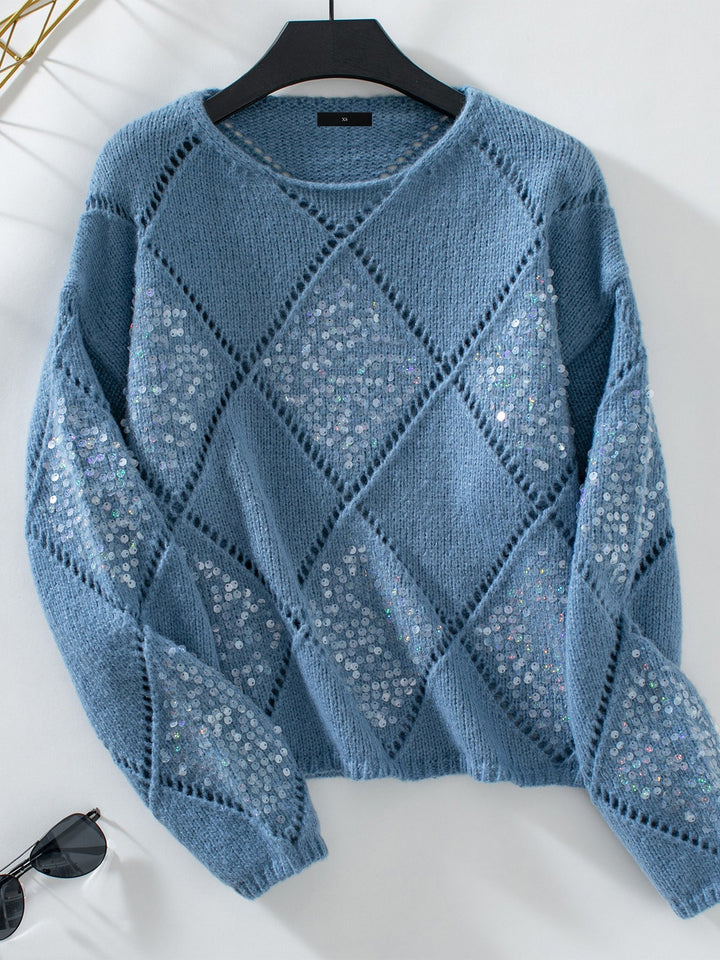 Comfortable women's sequin top with sparkling diamond pattern. Elegant long sleeve, crew neck sweater for parties.