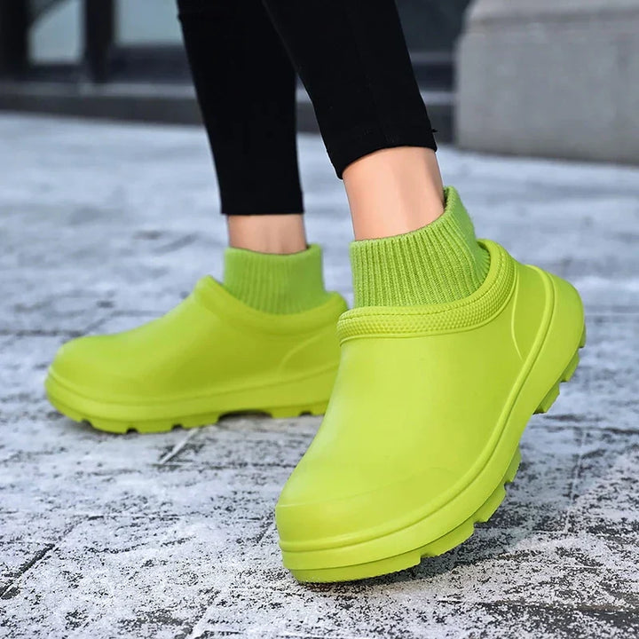 Madeline women's slip-on clogs, featuring a secure knit ankle cuff & durable non-slip sole.