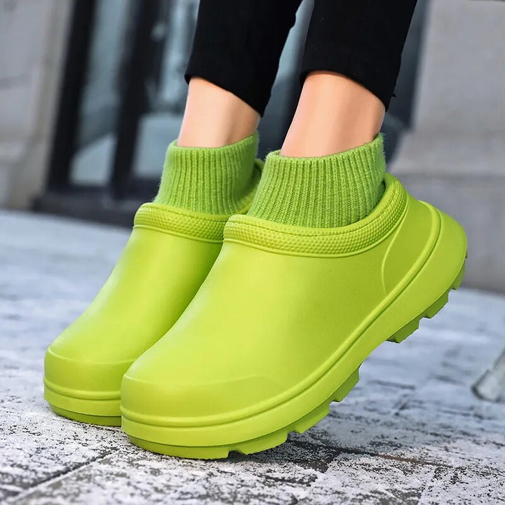 Durable women's slip-on waterproof clogs with knitted ankle cuff. Everyday comfort & style.
